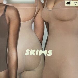 SKIMS strapless bodysuit size M color sand- light beige